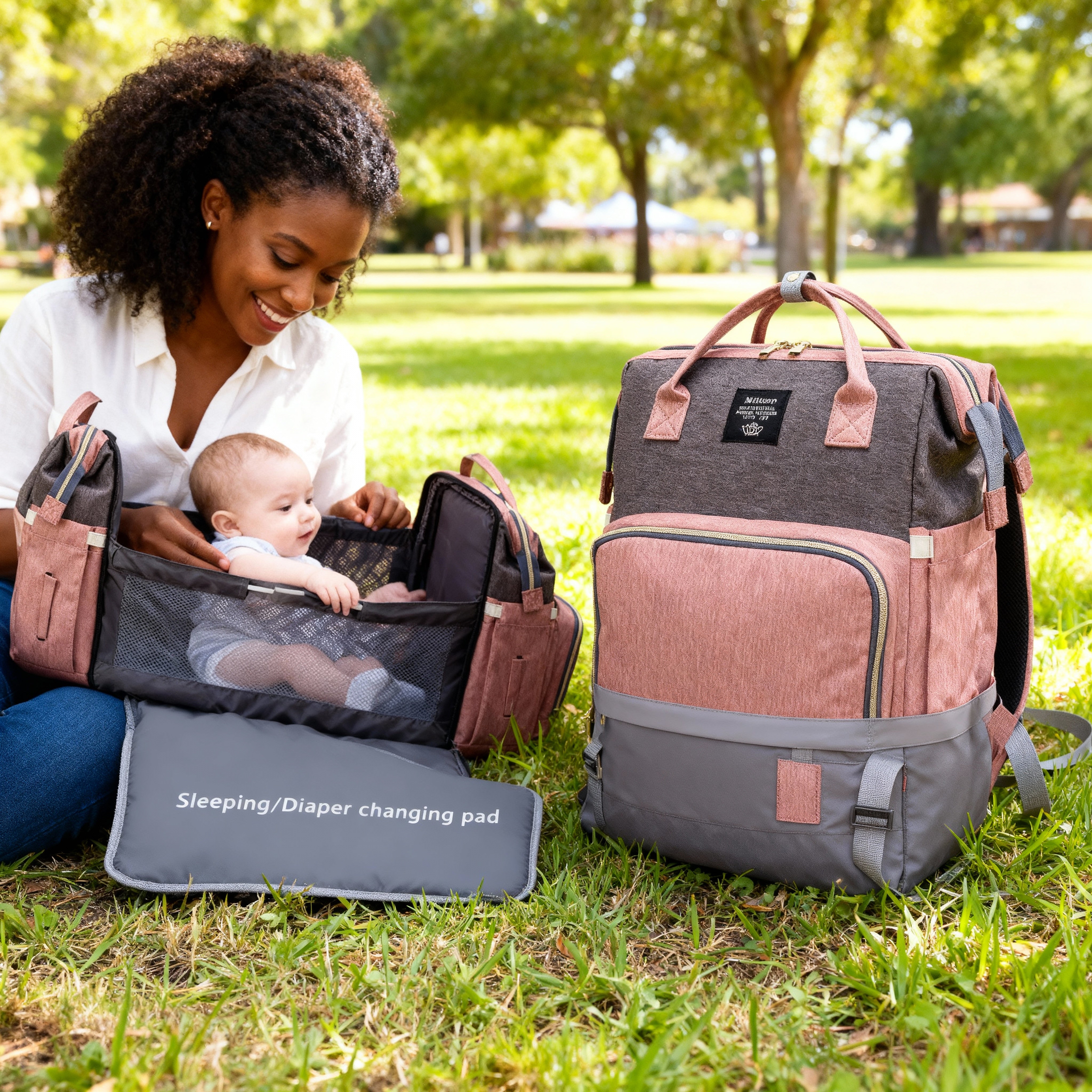 The Oasis 4-in-1 Diaper Backpack & Portable Baby Station