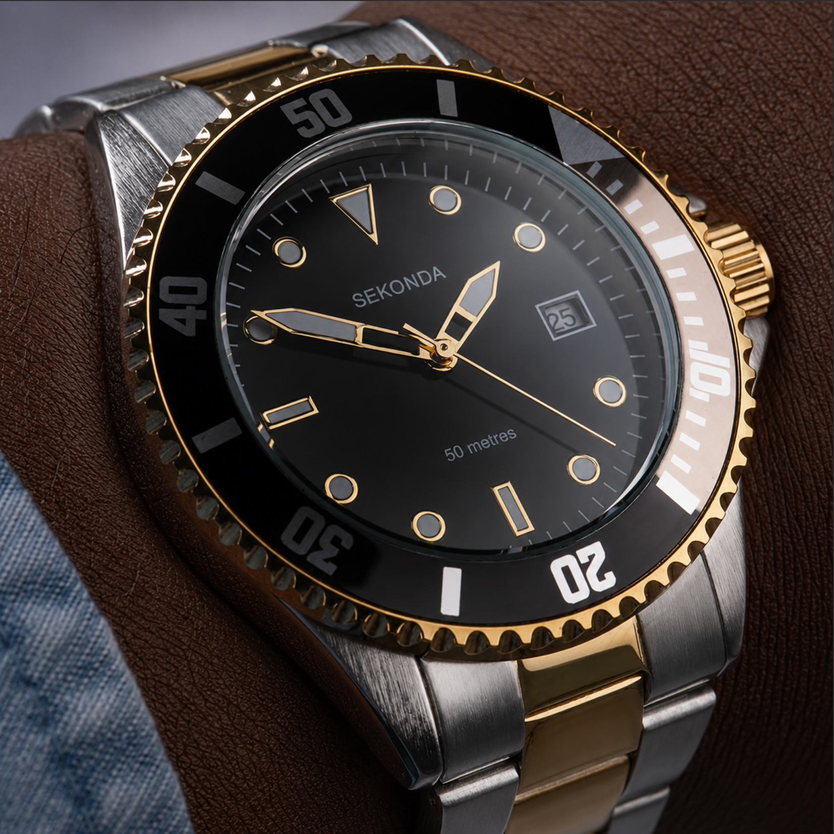 Sekonda watch with black dial and gold accents on a wrist.