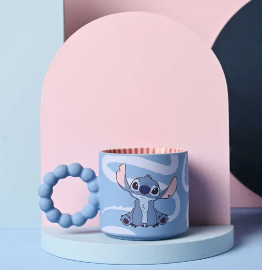 Children's cup with cartoon character design on a colorful background