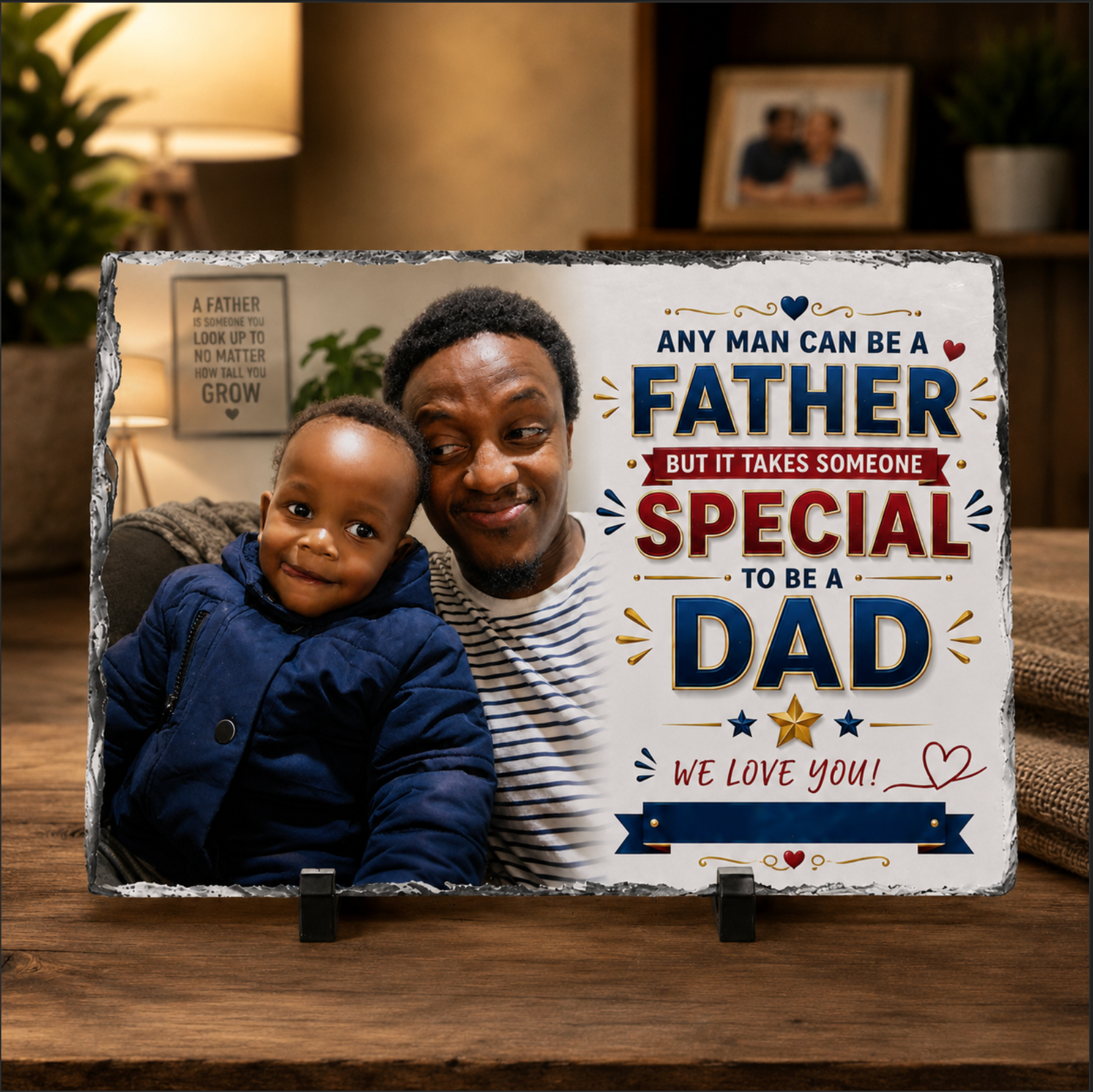 Decorative plaque with a father and child photo and motivational text on a wooden surface.