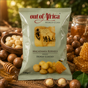 Package of Out of Africa honey-coated macadamia kernels surrounded by macadamias and honeycomb.