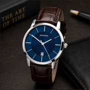 Sekonda watch with blue face and brown leather strap on a dark surface