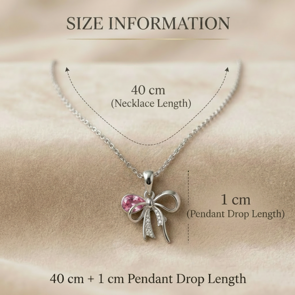 Necklace with bow pendant and size information on a beige background