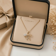 The Juliette Petite Bow Necklace - box