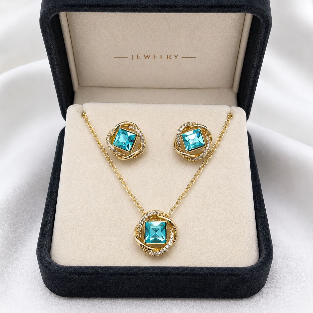 Jewelry set with turquoise stones in a jewelry box