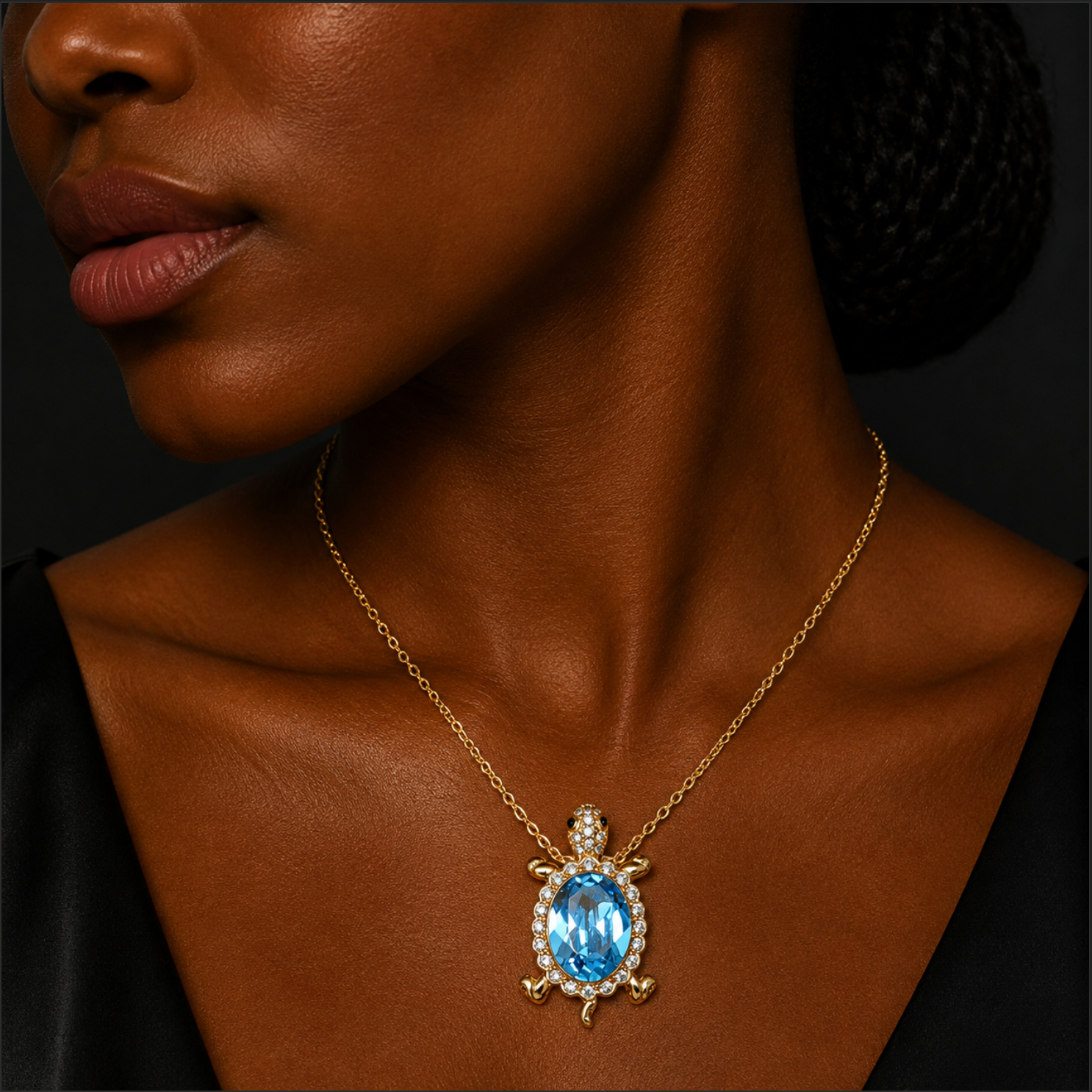 Necklace with a blue gemstone pendant on a model against a dark background