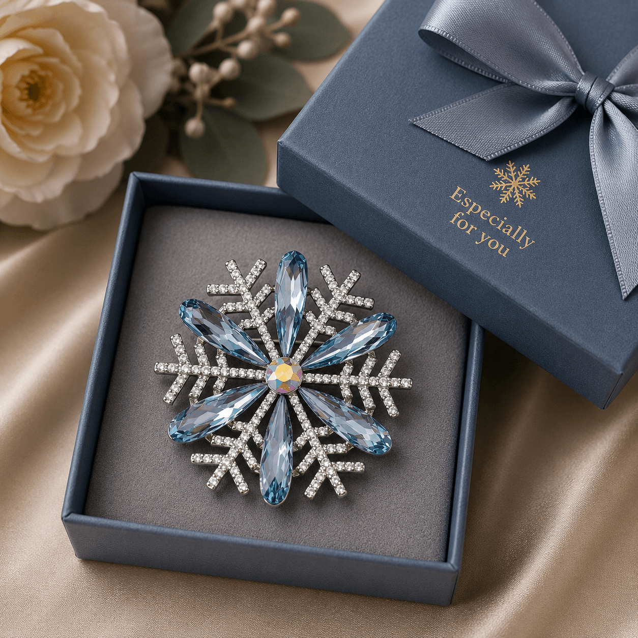Diamante snowflake brooch in a gift box with 'Especially for you' text.