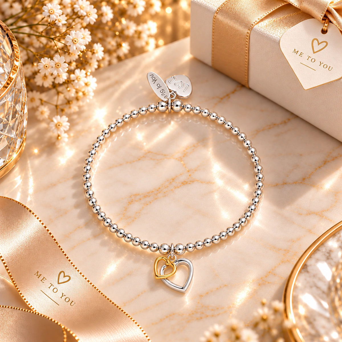 Friendship gift bracelet with heart charms, Kenya